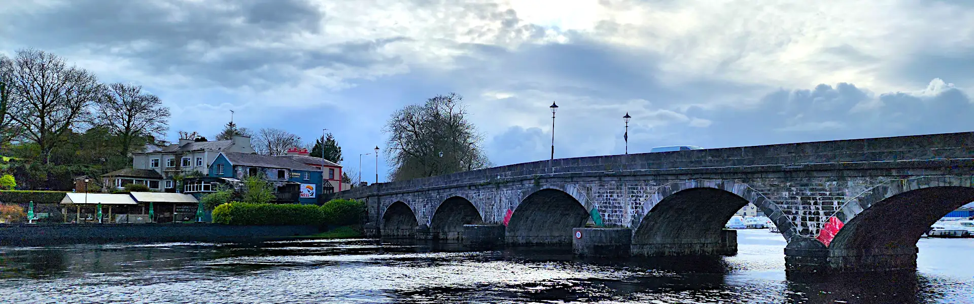 Photo of Carrick-on-Shannon bridge and buildings on opposite shore.